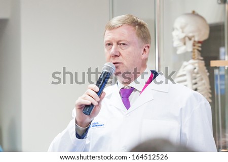 NOVOSIBIRSK - November 13: Anatoly Chubais - head of RUSNANO gives interview at the opening of a plant for production of ceramics. It is opening its new plant November 13, 2013, Novosibirsk, Russia