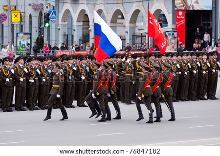 NOVOSIBIRSK - MAY 7: The Rehearsal of a parade dedicated to Victory Day in World War II, soldiers endure the national flag of Russia on May 7, 2011, Novosibirsk Russia