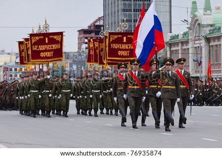 NOVOSIBIRSK - MAY 9: The on parade dedicated to Victory Day in World War II, soldiers endure the national flag of Russia on May 9, 2011, Novosibirsk Russia