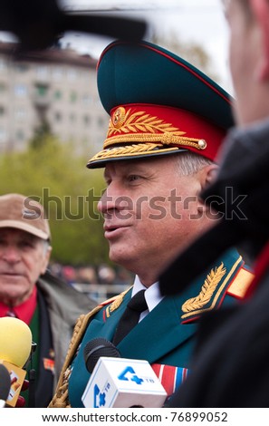 NOVOSIBIRSK - MAY 9: Commander of the 41st Army, Vasiliy Tonkoshkurov, gives interview after the parade of victory dedicated to the 66th of victory in World War II on May 9, 2011, Novosibirsk Russia