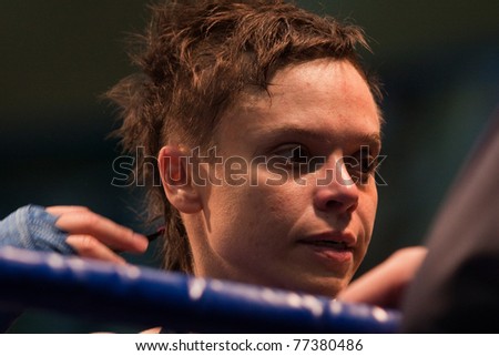 NOVOSIBIRSK - MAY 15: Russian Championship in women\'s boxing.portrait Olesya Gladkova after winning the first match in the championship on May 15, 2011, Novosibirsk Russia