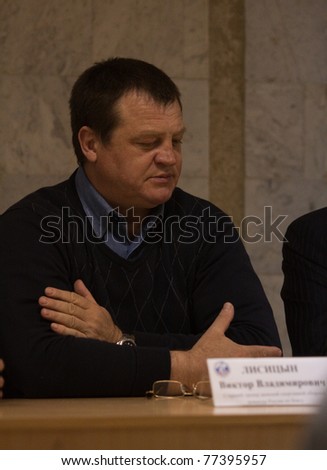 NOVOSIBIRSK - MAY 15: Russian Championship in women\'s boxing. Viktor Lisitsyn (coach of Russian national women\'s boxing) answers questions at the press conference on May 15, 2011, Novosibirsk Russia