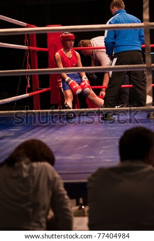 NOVOSIBIRSK - MAY 15: Russian Championship in women\'s boxing. The coach sets up and gives her instructions. Gorozhantseva Anastasia and her coach. on May 15, 2011, Novosibirsk Russia