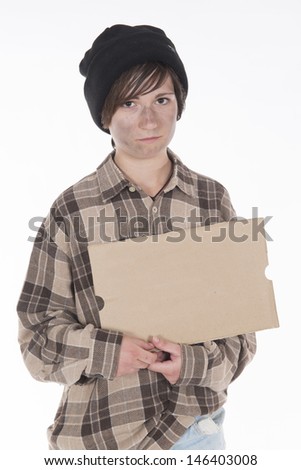Shooting in a studio Homeless with a sign in her hand