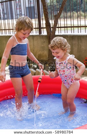 Children have fun playing with water