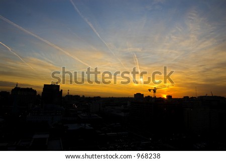 Dramatic yellow urban sunset