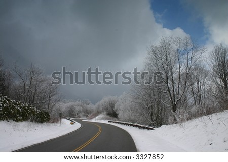 Snow and a curving road, Cherohala skyway at about 5000 feet in appalachia, North Carolina