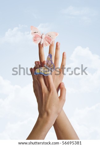 butterflies on hands