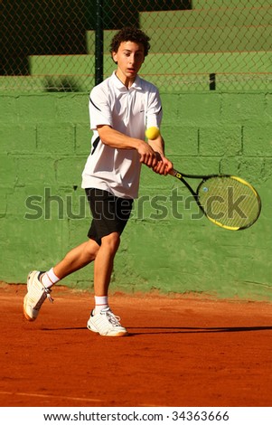 MALAGA, SPAIN – JANUARY 11 : Antonio Ayala in action during the final match of the 1st round of the Nike Junior Tennis Tour tournament at Malaga Tennis Club January 11, 2009 in Malaga, Spain.