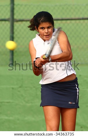 MALAGA, SPAIN – JANUARY 11 : Maria Jose Luque in action during the final match of the 1st round of the Nike Junior Tennis Tour tournament at Malaga Tennis Club January 11, 2009 in Malaga, Spain.