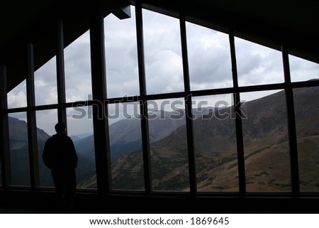man in window at alpine visitor center in rocky mountain national park, colorado