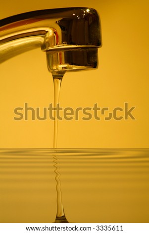 abstract water faucet reflection concept