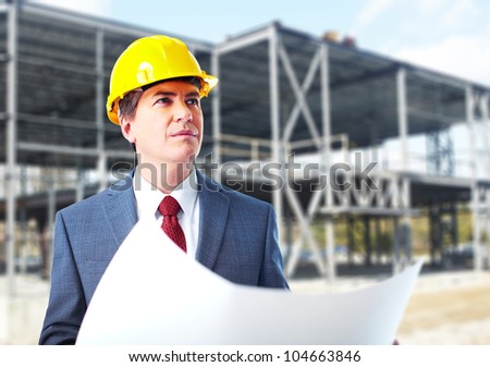 Engineer constructor with a project. Industrial worker.