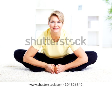 Senior woman doing yoga. Healthy lifestyle.
