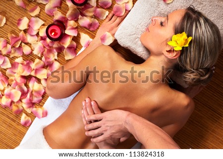 Young Woman In Spa Massage Salon. Relax.