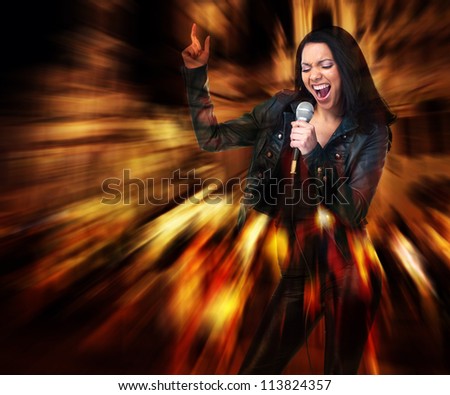 Rock star. Sexy woman singing. Karaoke.