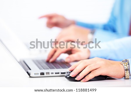 Hand with a computer mouse. Business technology background.