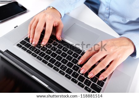 Hands of accountant with a computer keyboard. Business lifestyle background.