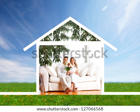 Happy family at home. Real estate and construction concept.