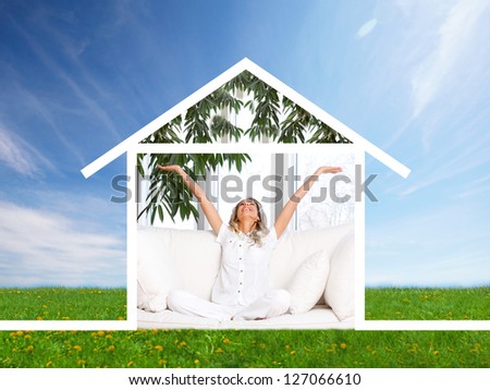 Happy woman at home. Real estate and construction concept.