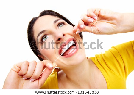 Beautiful woman with a dental floss. Dentist health care clinic.