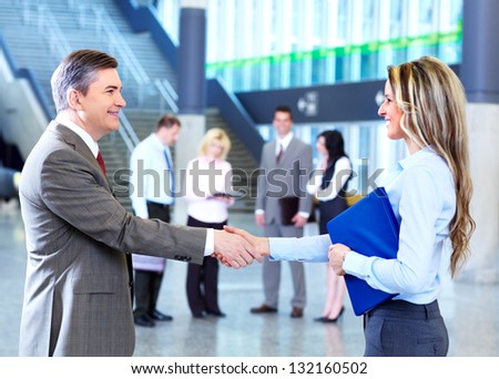 Group of business people in a modern hall. Meeting.
