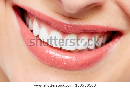 Beautiful woman smile. Dental health care background.