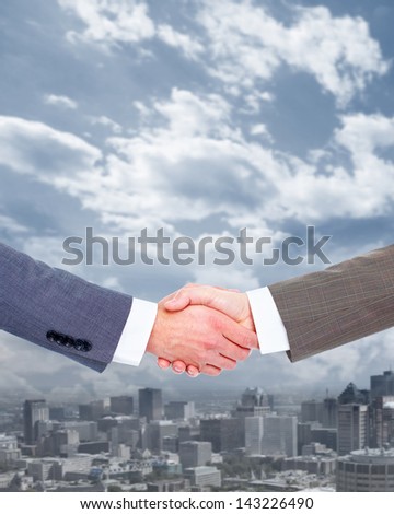 Handshake of two businessmen. Business meeting concept.