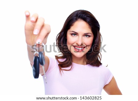 Woman with a car keys. Isolated on white background.