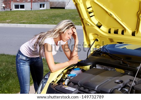 Woman near broken car. Auto repair service concept.