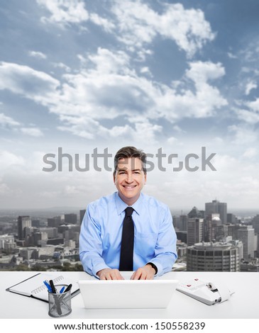 Portrait of handsome Businessman working in the office.