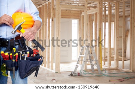 Handyman With A Tool Belt. House Renovation Service.