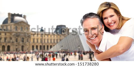 Senior couple in Paris. Tourism and traveling background.