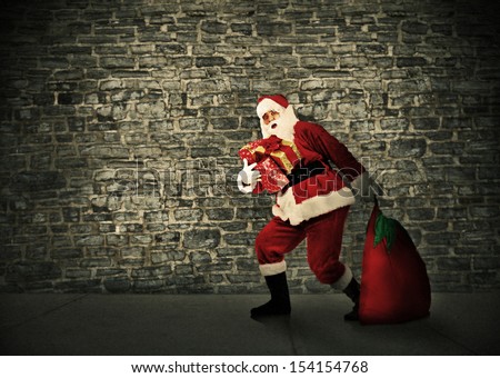 Christmas Santa with a bag. Gifts delivery concept.