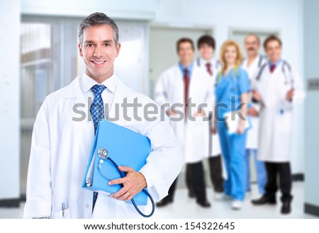 Smiling family doctor with stethoscope. Health care.
