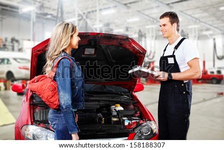 Car Mechanic In Uniform. Auto Repair Service.