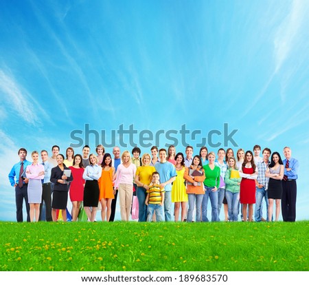 Big family people group over blue sky background.