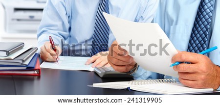 Hands of man with paper sheet. Accounting.