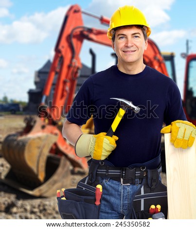 Construction worker near excavator. Home renovation background