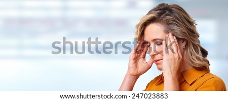 Woman having headache migraine. Stress and depression.