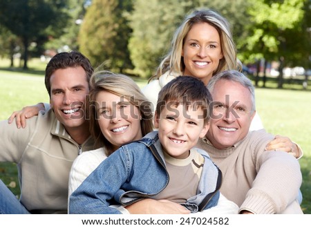 Happy family over park nature background. Recreation