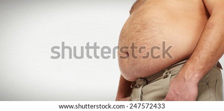 Fat belly. Man with overweight abdomen. weight loss.