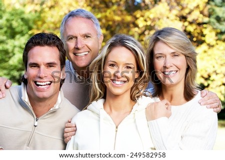 Happy family over park nature background. Recreation