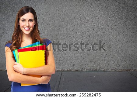 Young beautiful student woman portrait. Education background.