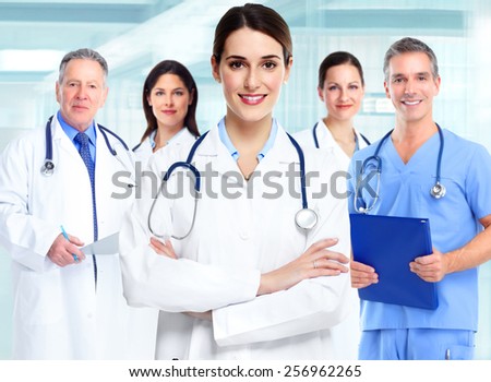 Medical doctor  woman and group of business people.