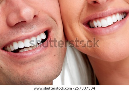 People smile. Happy loving couple healthy teeth.