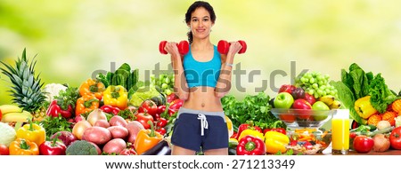 Happy young woman over healthy diet background.