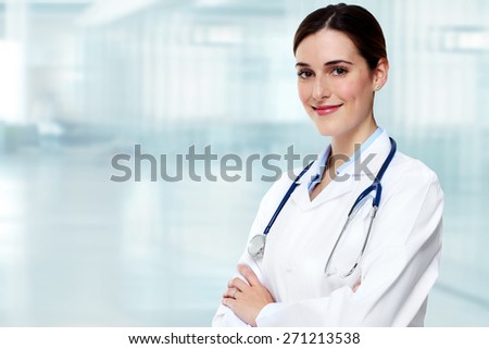 Medical physician doctor  woman over blue clinic background.