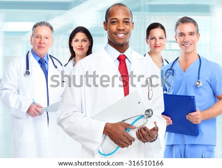 Medical physician doctor man and group of business people.