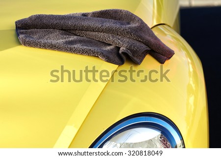 Car with wax and polish cloth. Waxing and polishing.